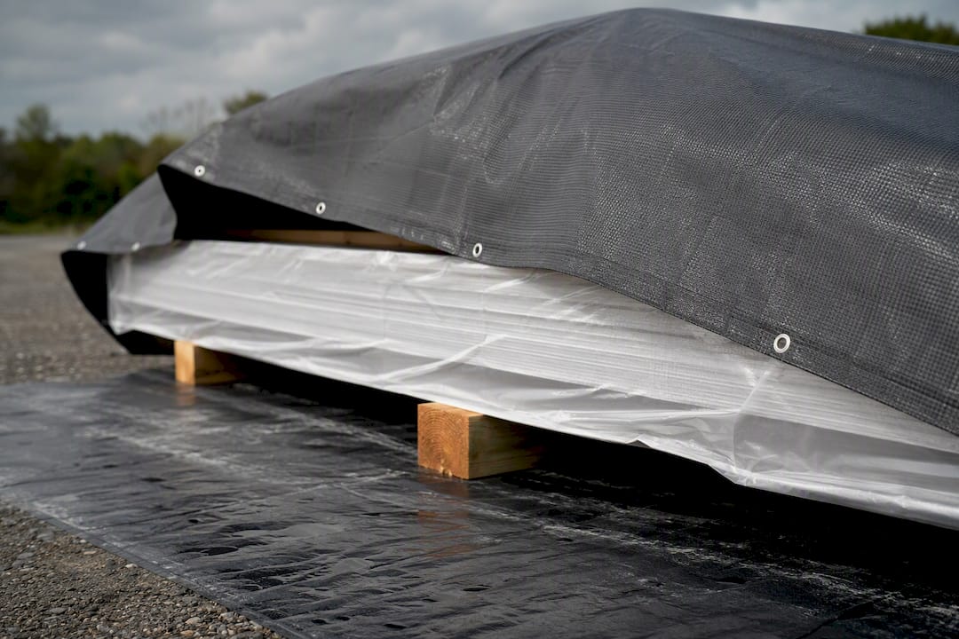 Wrapped panel bundle raised for storage