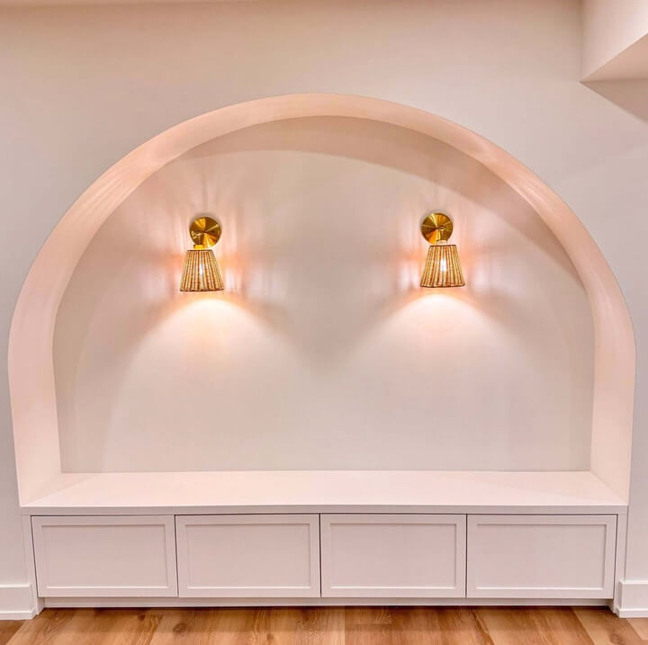 Focus on Custom Wall finish and lighting in basement renovation project