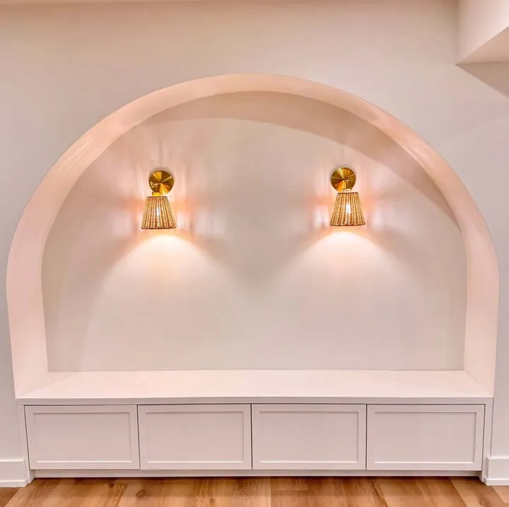 Focus on Custom Wall finish and lighting in basement renovation project