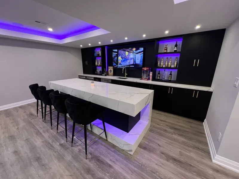 basement bar black cabinets led waterfall island