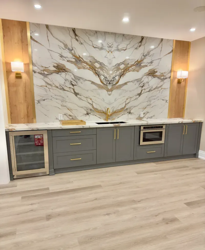 basement bar gold marble backsplash wood accents