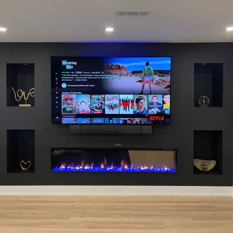 basement dark media wall linear fireplace niches
