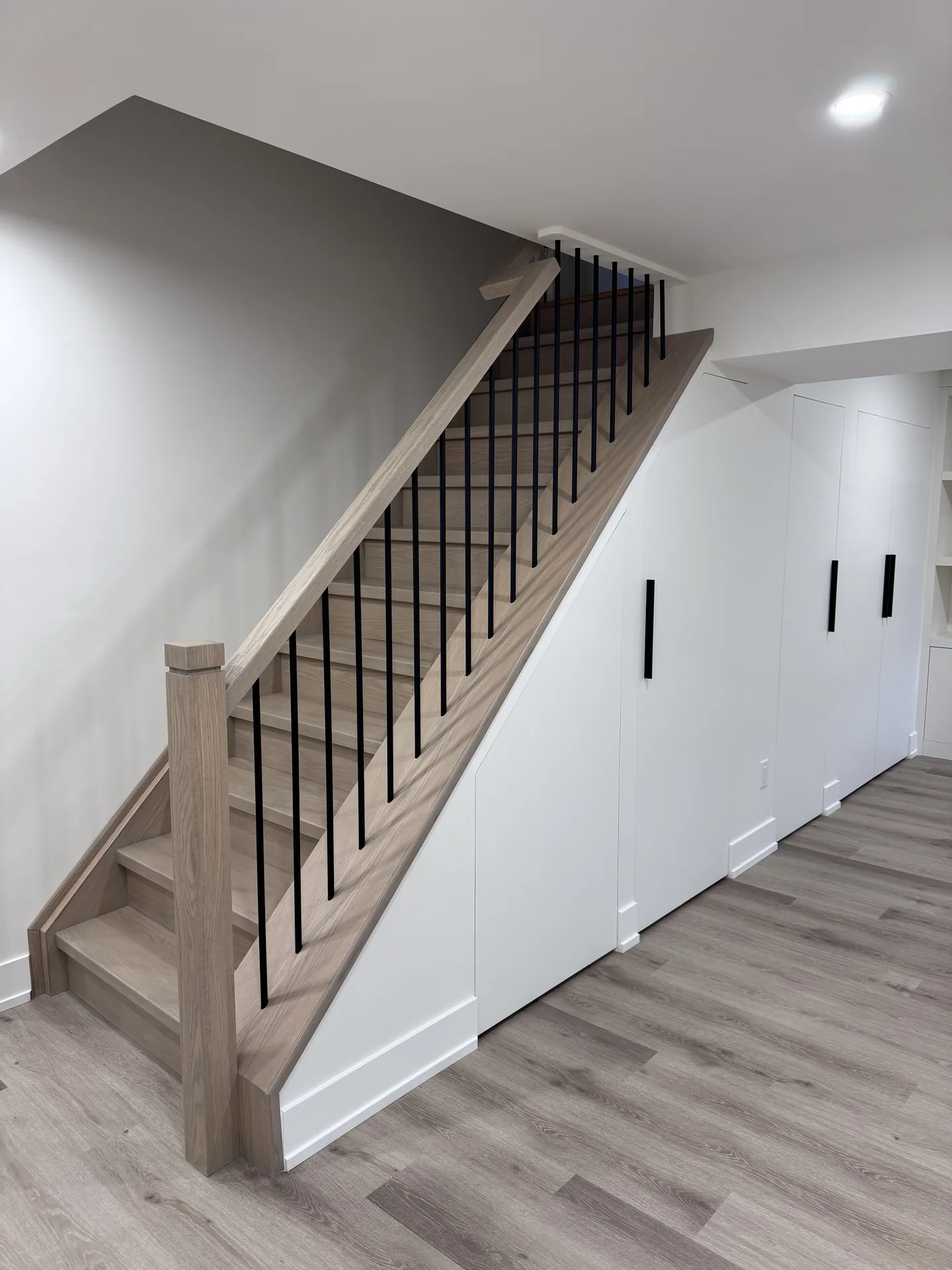 Structural work in Ajax — basement staircase with built-in storage underneath