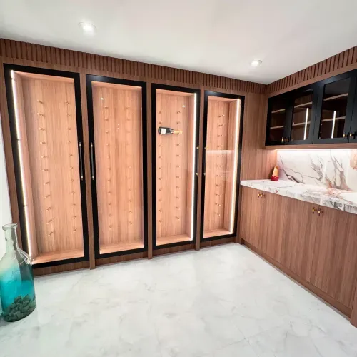 Walnut wine cellar and humidor cabinets — Desire Basements project, Kleinburg