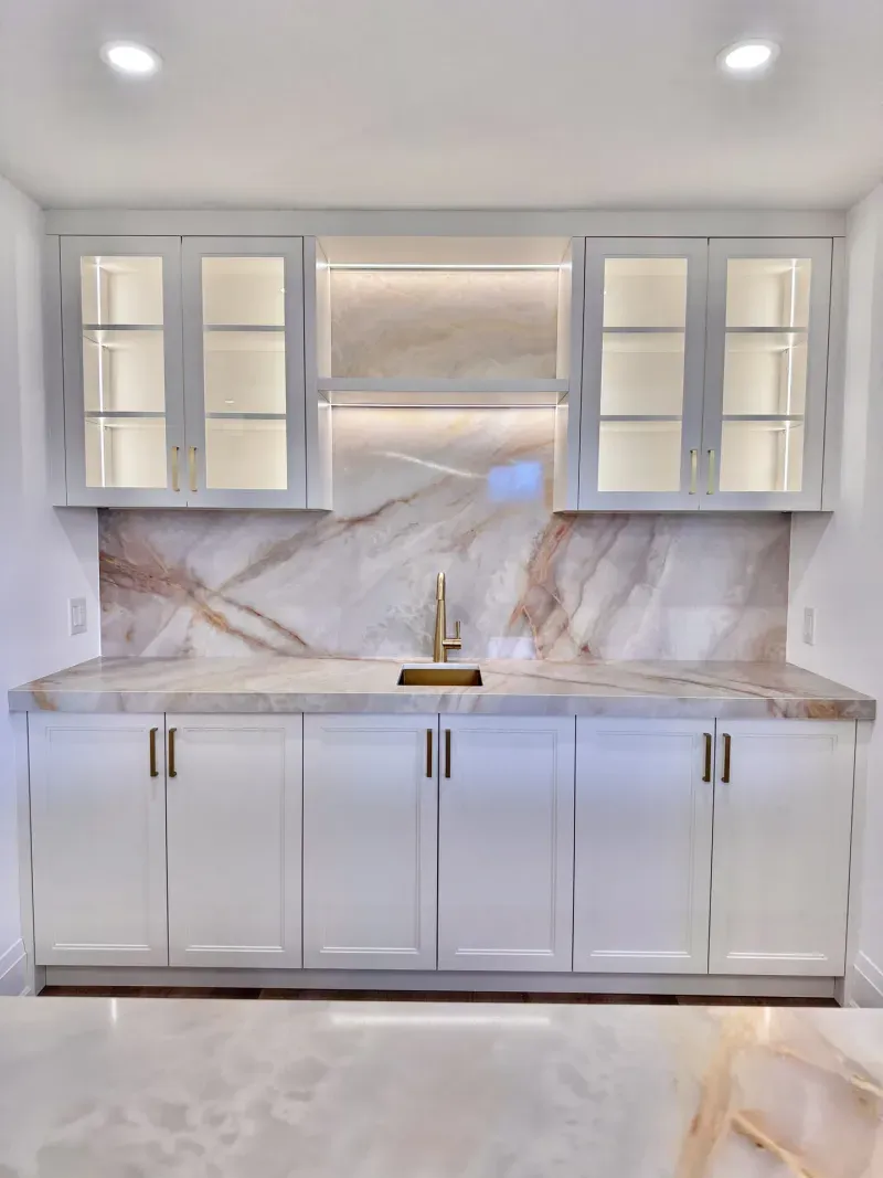 basement white bar marble backsplash glass cabinets