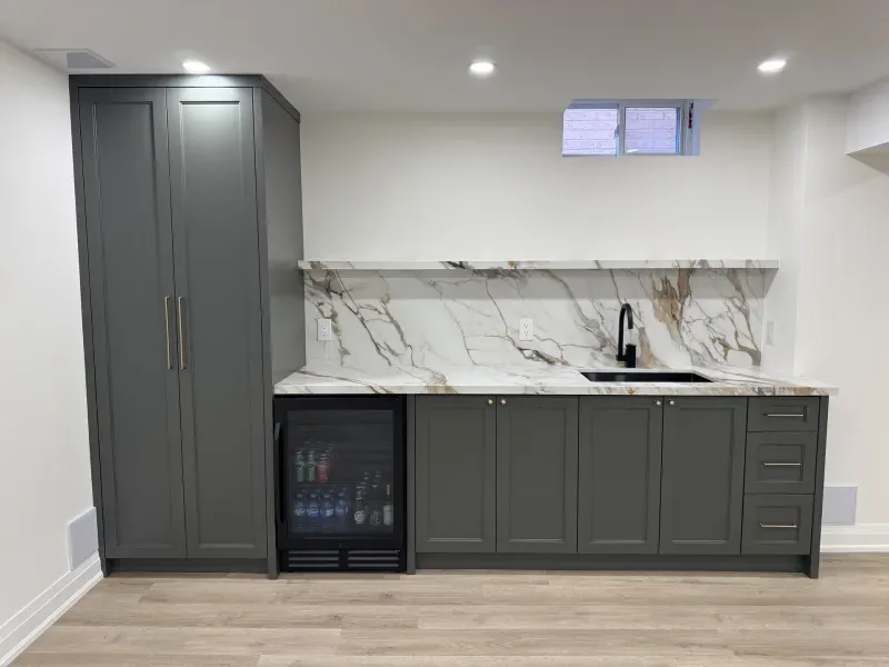 basement wet bar grey cabinets marble backsplash