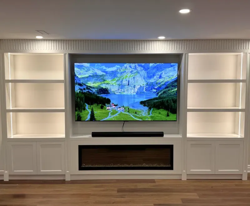 basement white tv wall fluted panels fireplace