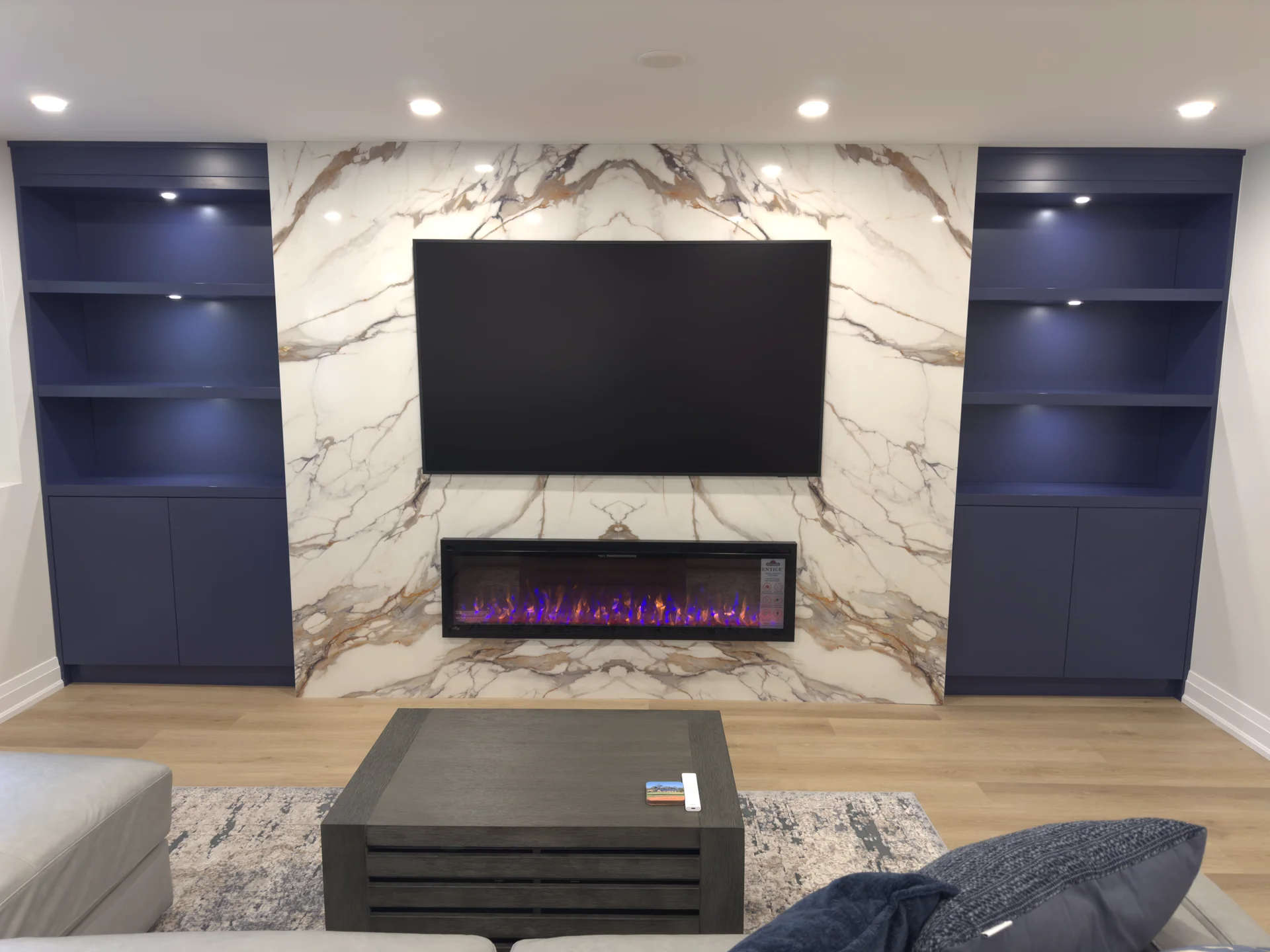 basement marble slab tv wall dark builtins