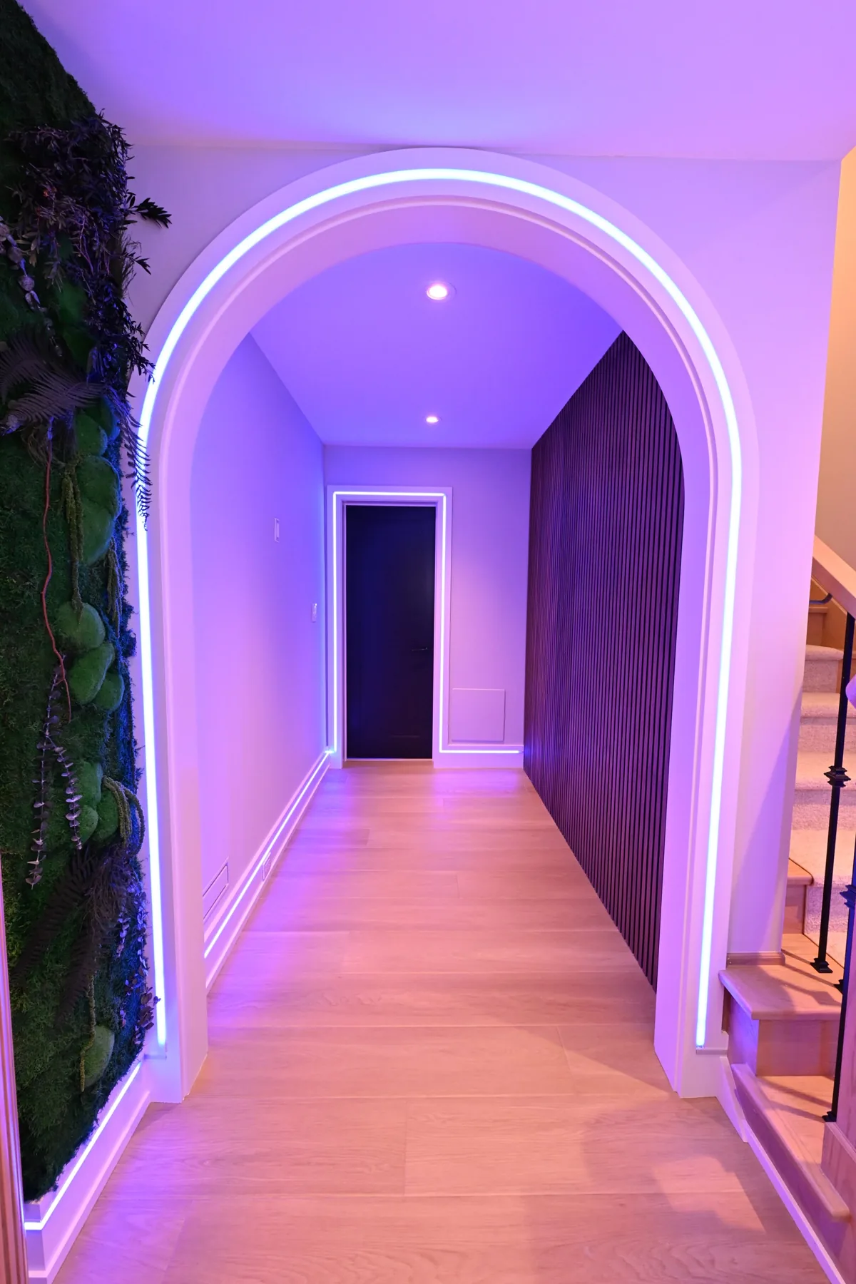 LED-lit arch and preserved-moss wall at the entrance to Sickick Studio