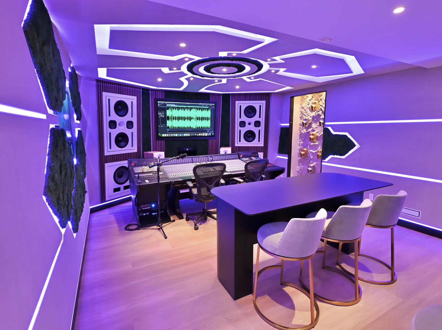 Writing table facing the console under the spaceship ceiling at Sickick Studio