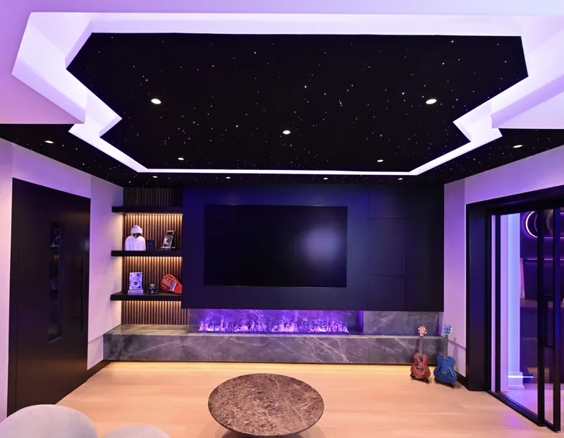 Star-ceiling lounge and media wall at Sickick Studio by Desire Basements