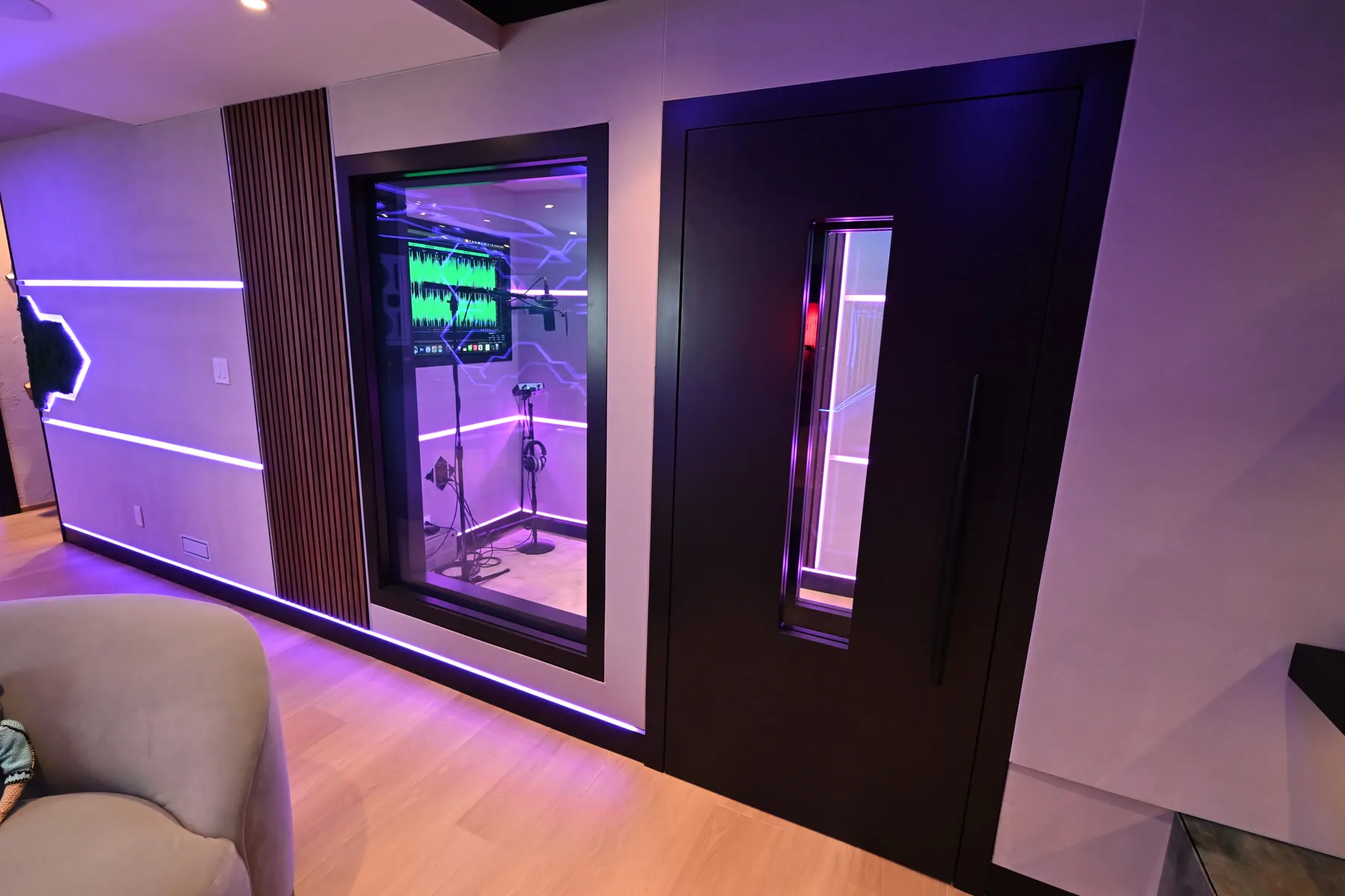 Sickick Studio vocal booth door with a sealed window and pink LED light inside