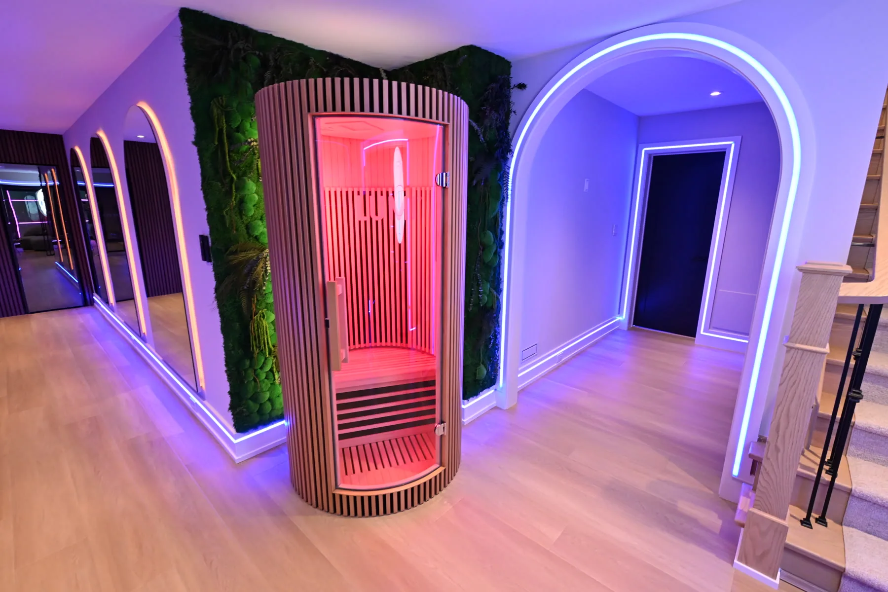 Sickick Studio sauna behind a moss wall with LED arches