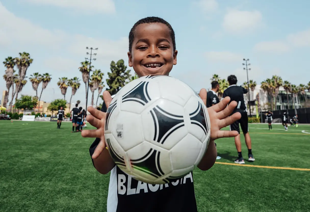 Kid with soccer ball