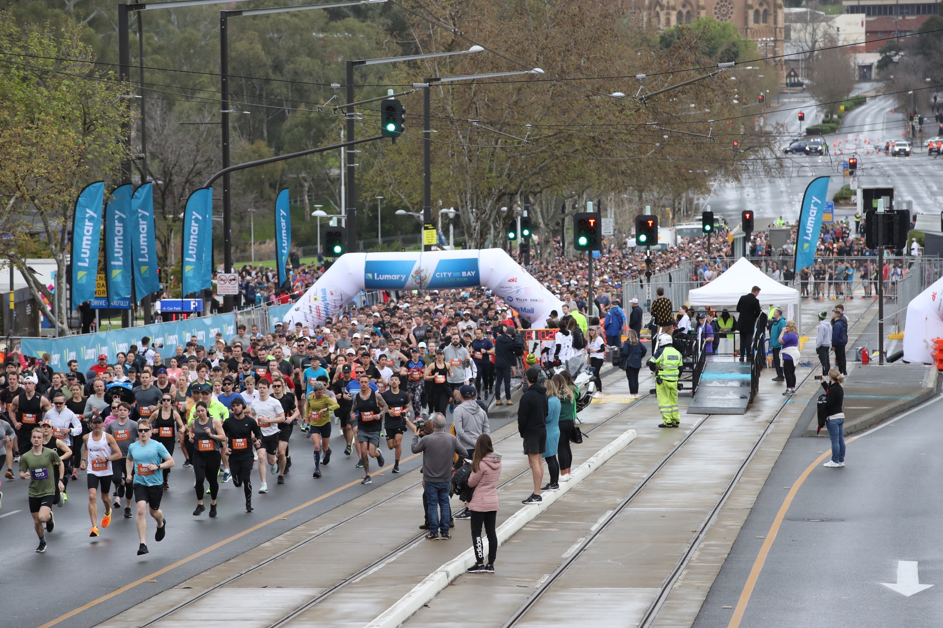 Runners on the road to Glenelg at the City-Bay Fun Run