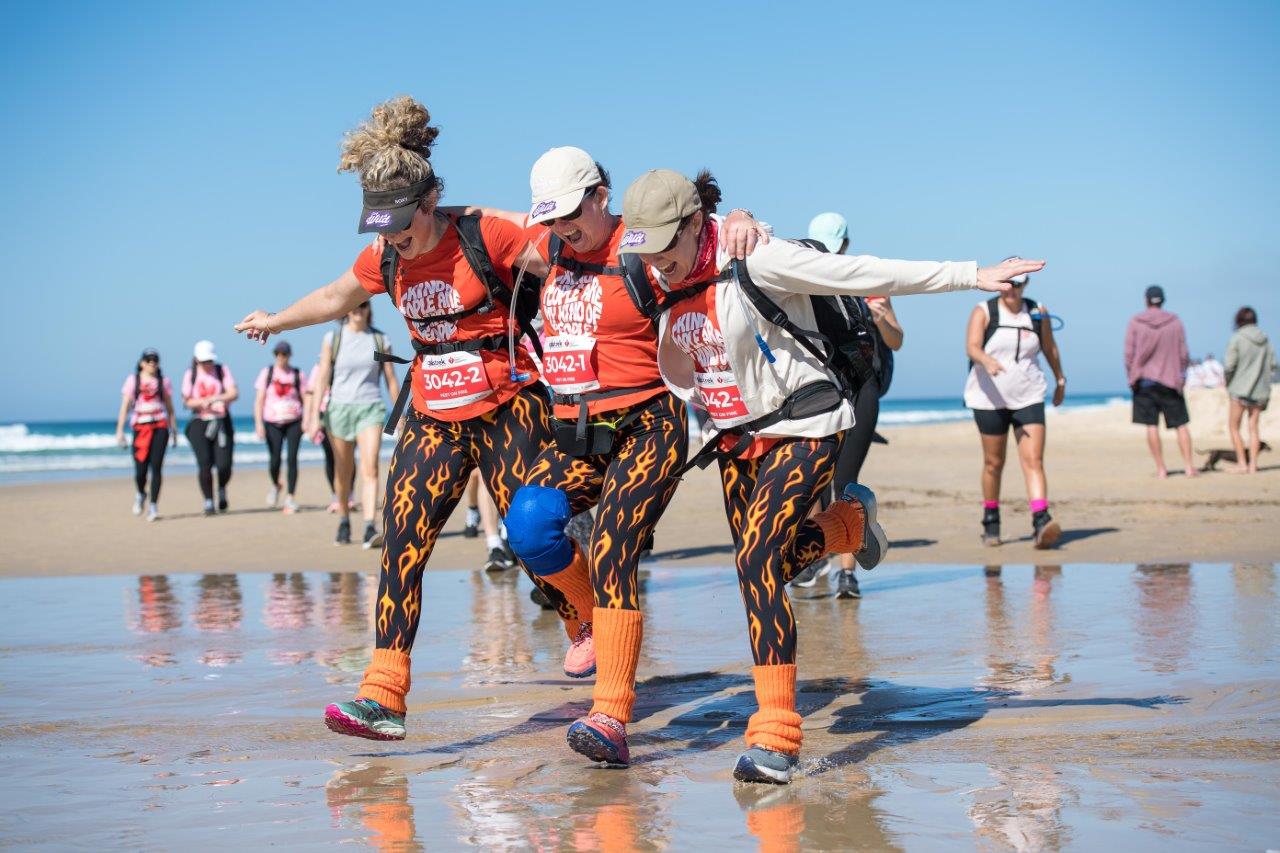 Walkers on the beach at Coastrek Sunshine Coast