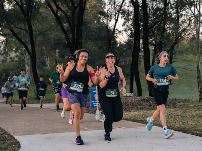 Runners beside the River Torrens at the River Torrens Running Festival in Adelaide