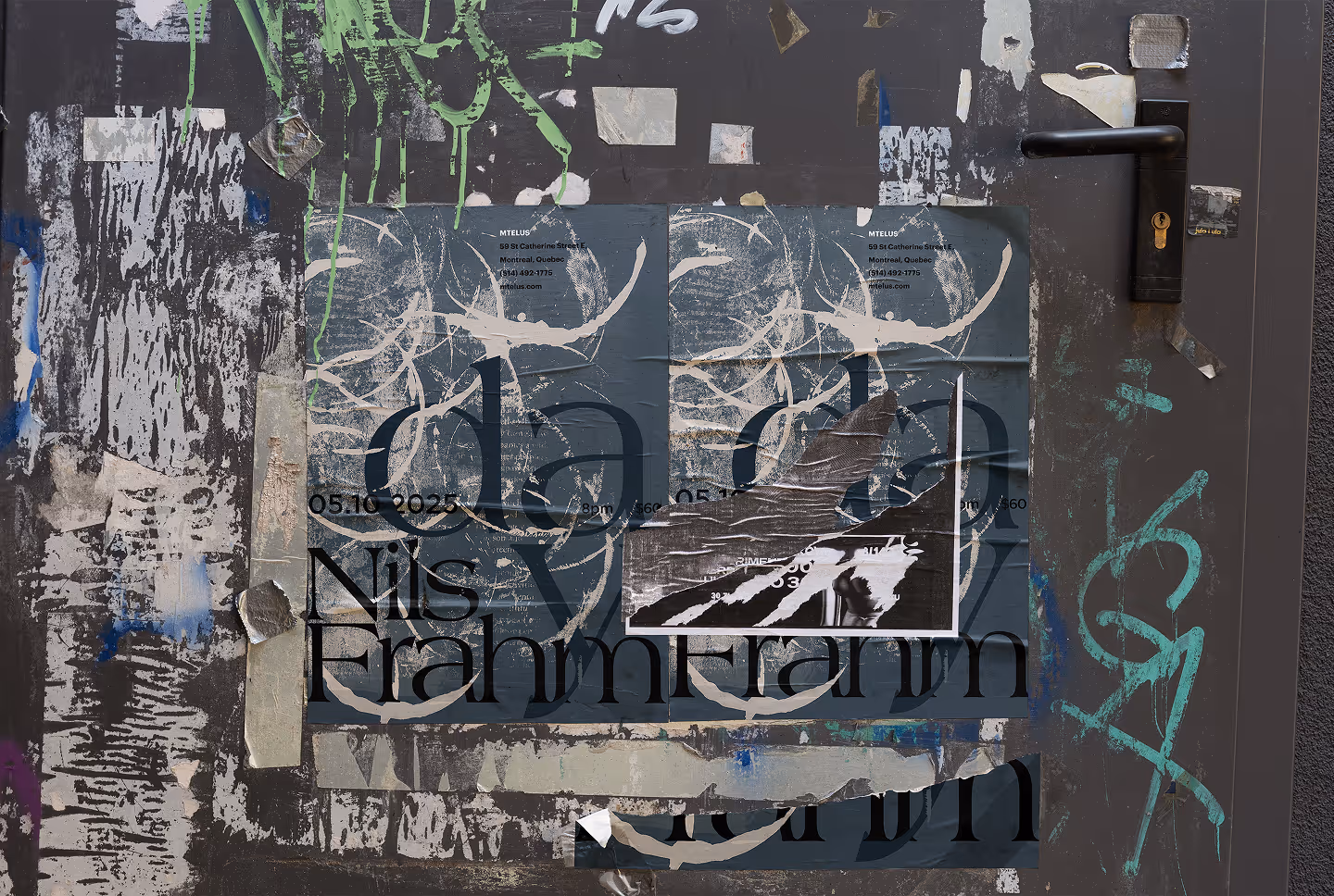 A grungy door covered in torn posters and graffiti in green and blue, with a black handle. (mockups-design.com)