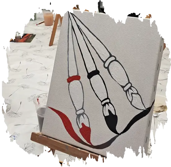 Canvas painting of three paintbrushes with red and black paint strokes on an easel.