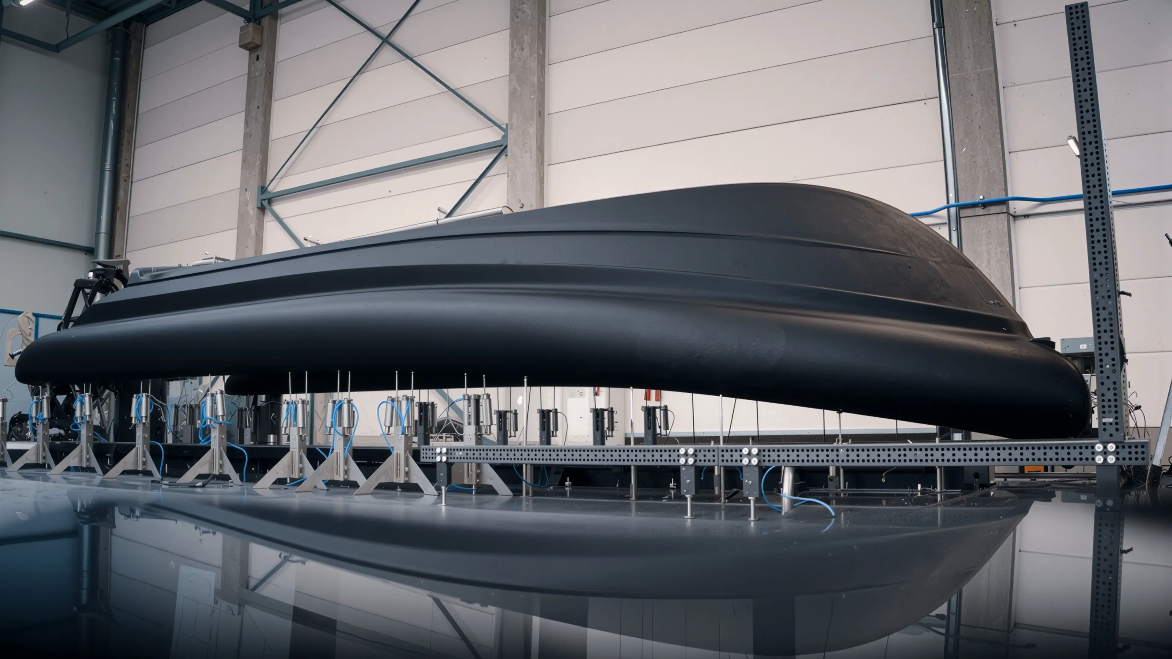 3D printed HDPro hull on stands in the Dutch Boat Factory production hall