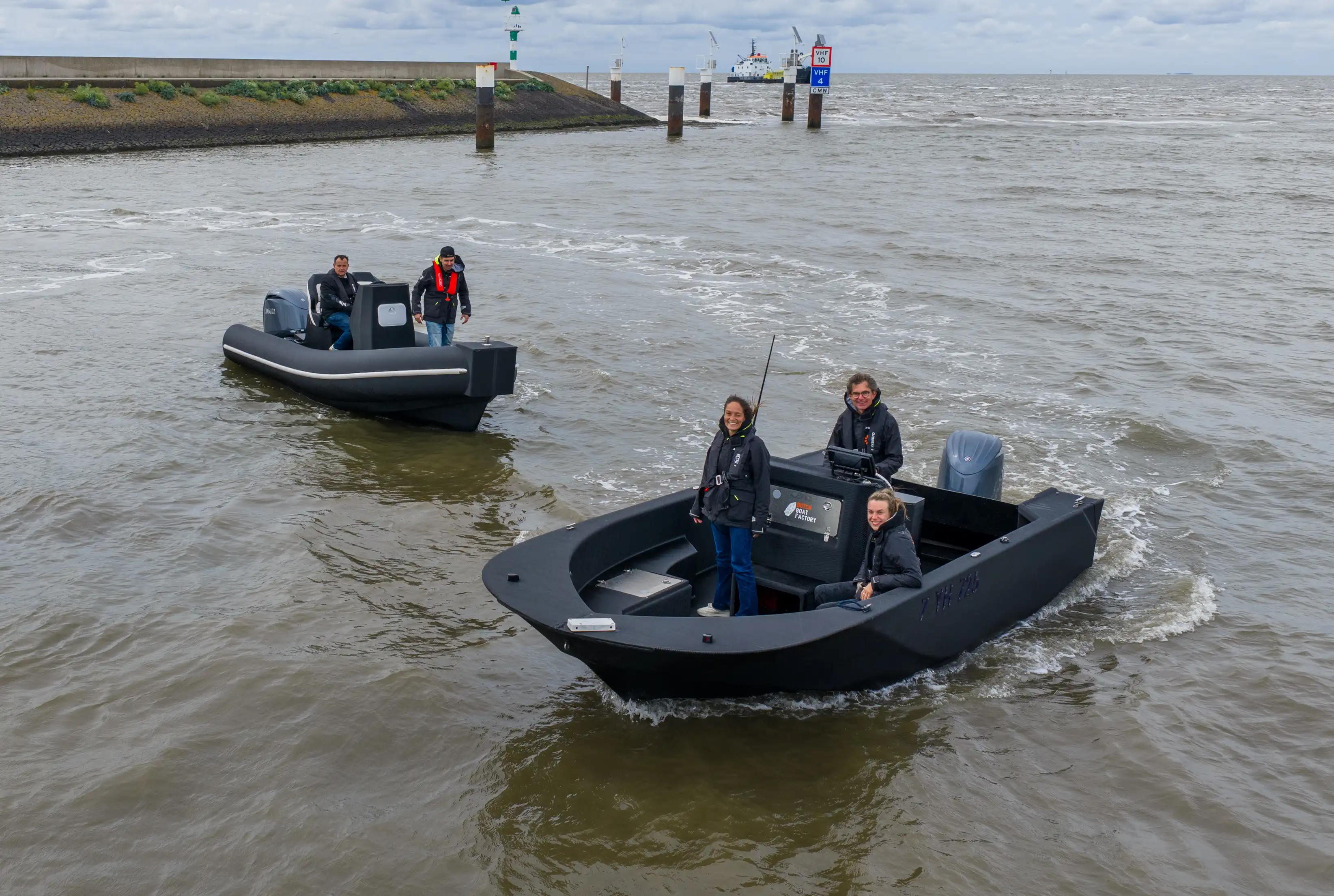 Close-up of black HDPro granulate, the thermoplastic used to 3D print the hulls