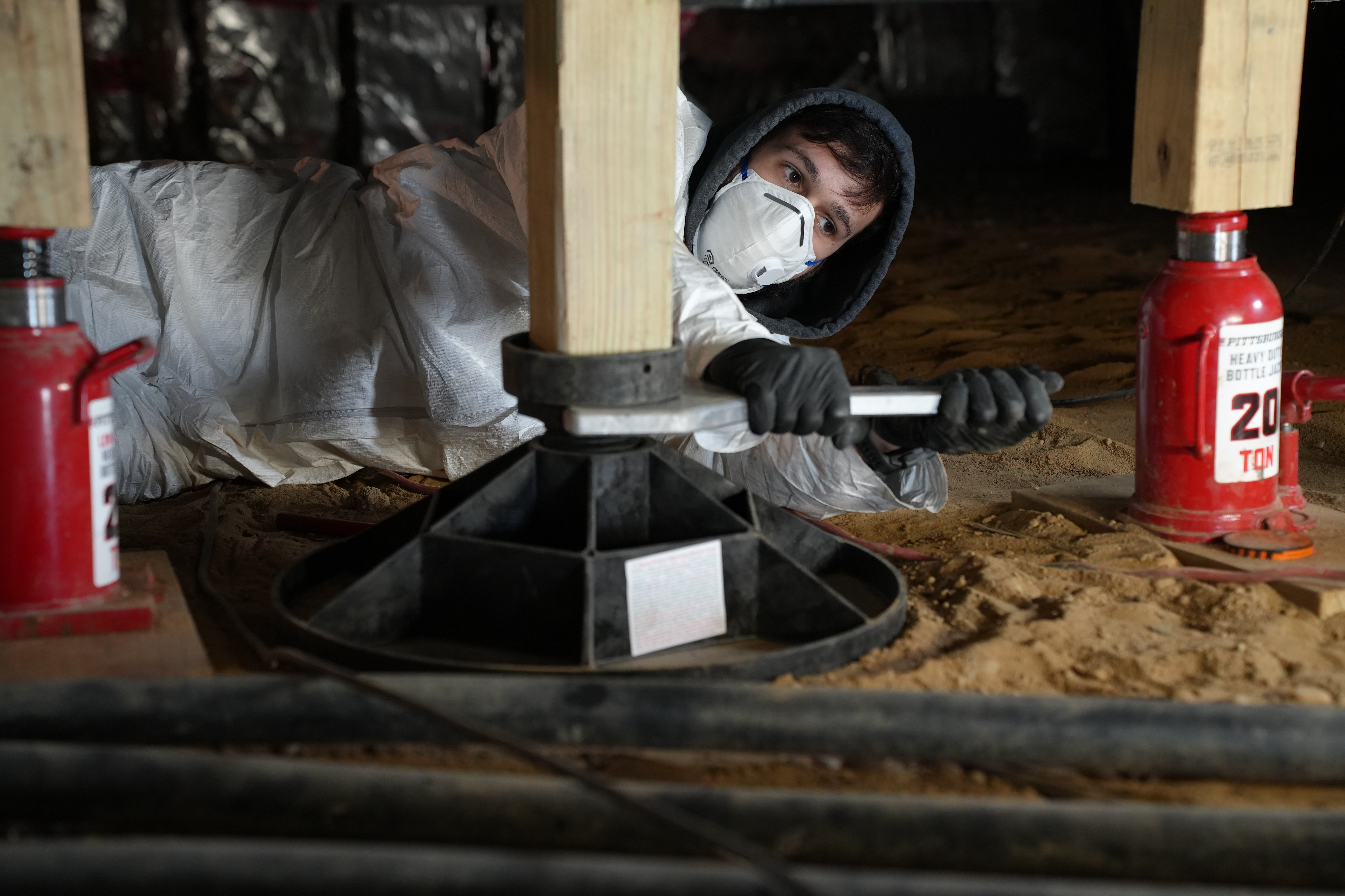 Close-up of precision foundation repair work