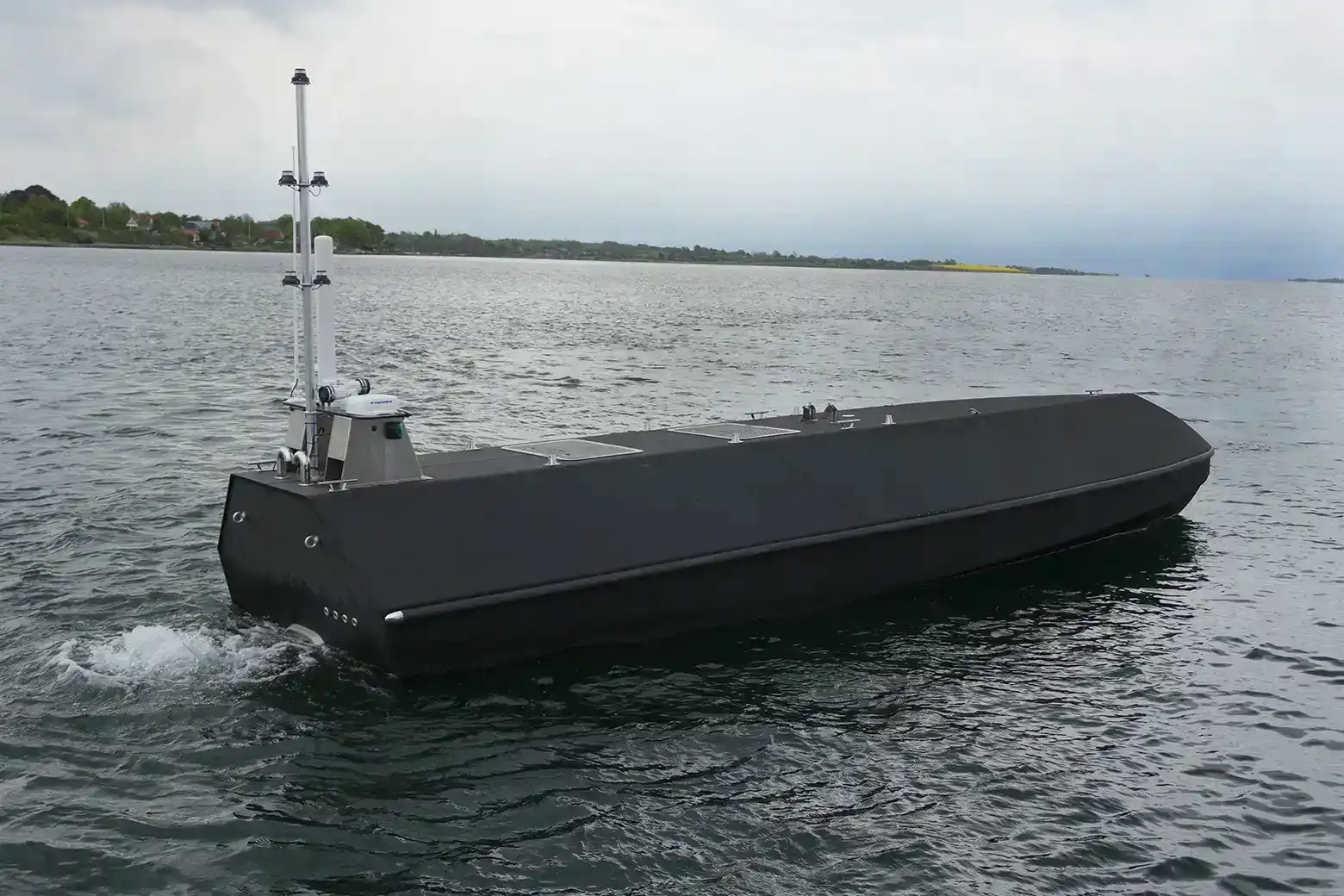 Unmanned surface vessel with a 3D printed HDPro hull underway on open water