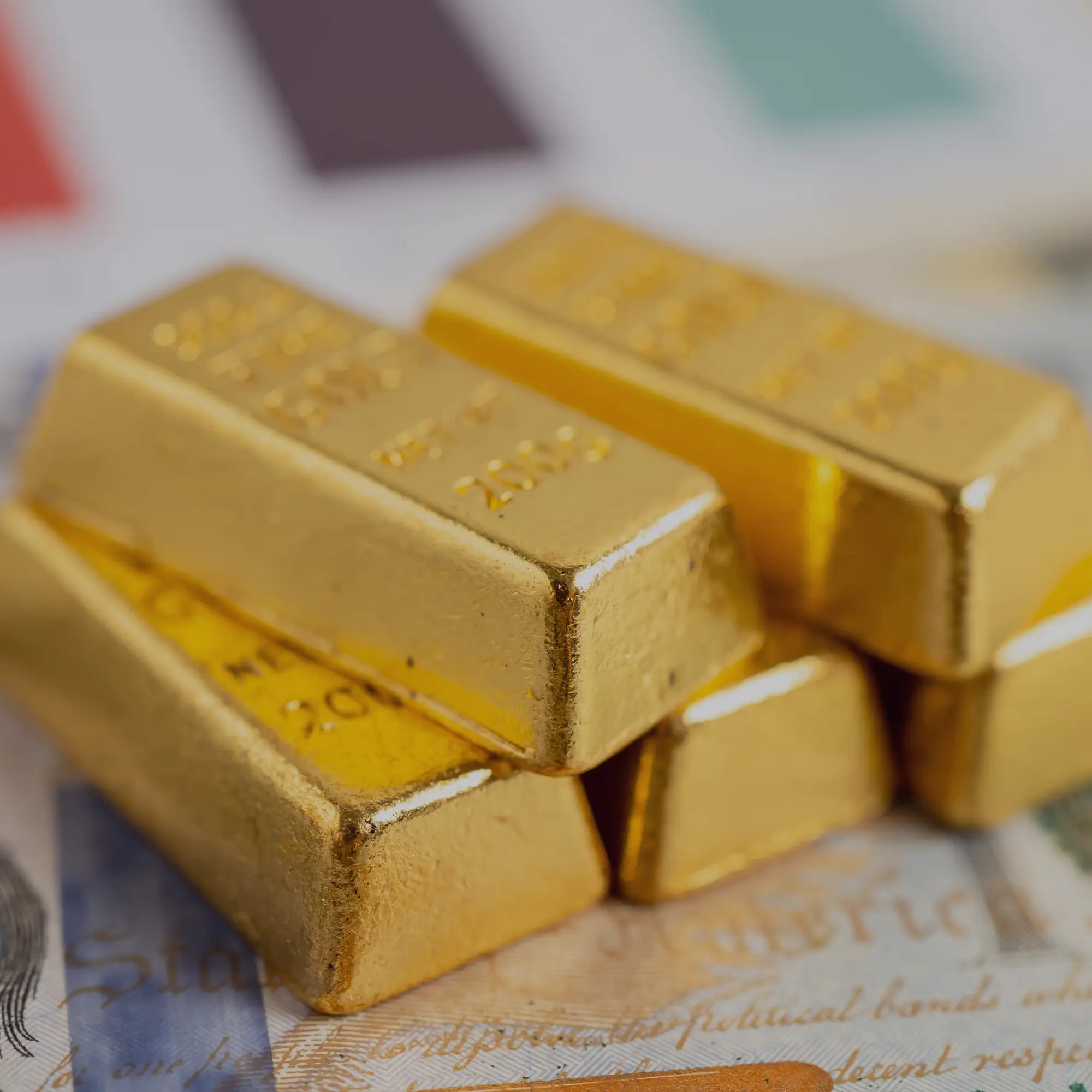 "Stack of gold bars symbolizing traditional safe-haven investments, reflecting the timeless role of gold in financial strategy amid changing global markets."