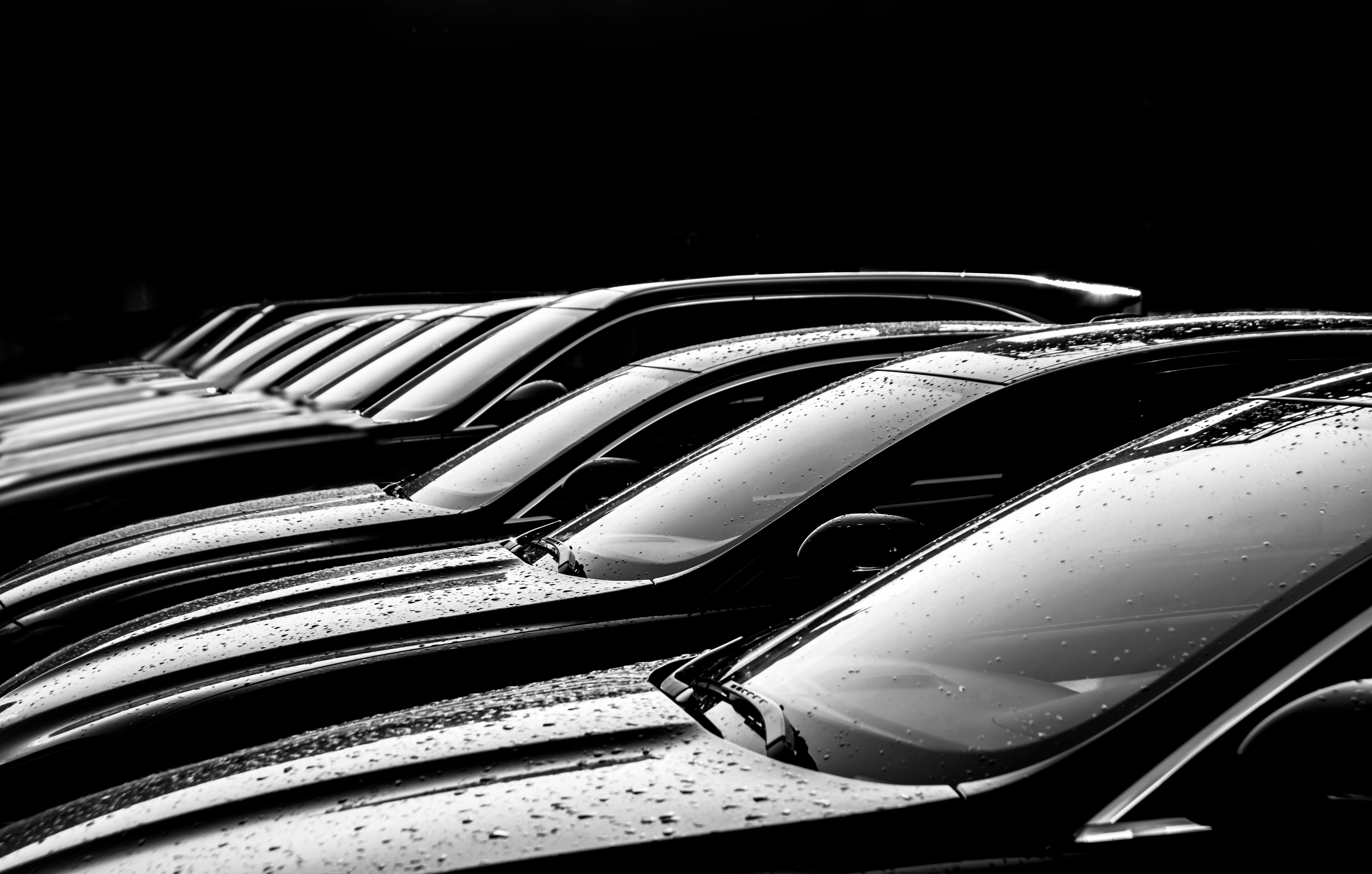 cars lined up in black