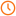 Orange clock with white face and black markings showing the time at about 11:10.