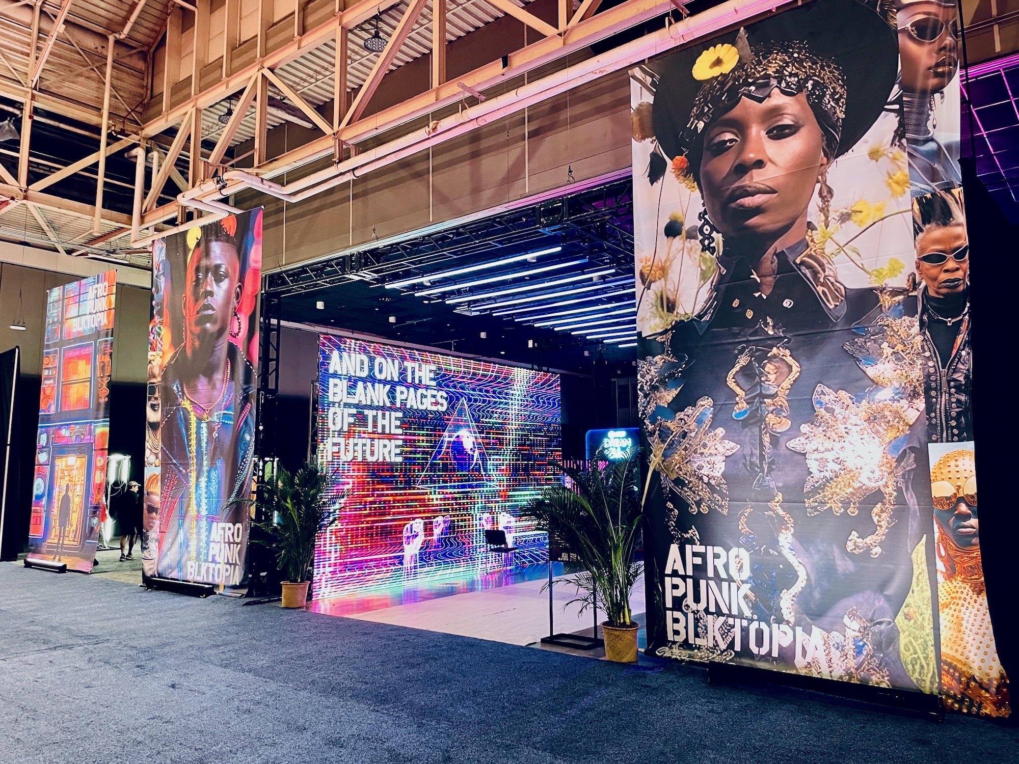 Illinoise stage set with dramatic concert lighting and the show's name displayed