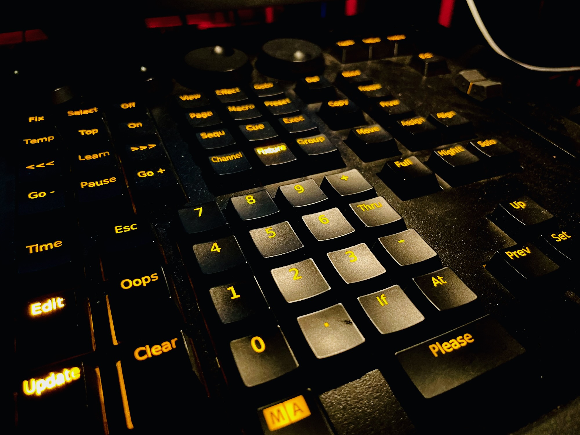 Close-up of a lighting control console.