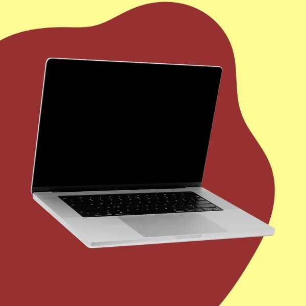 Laptop på röd och gul botten