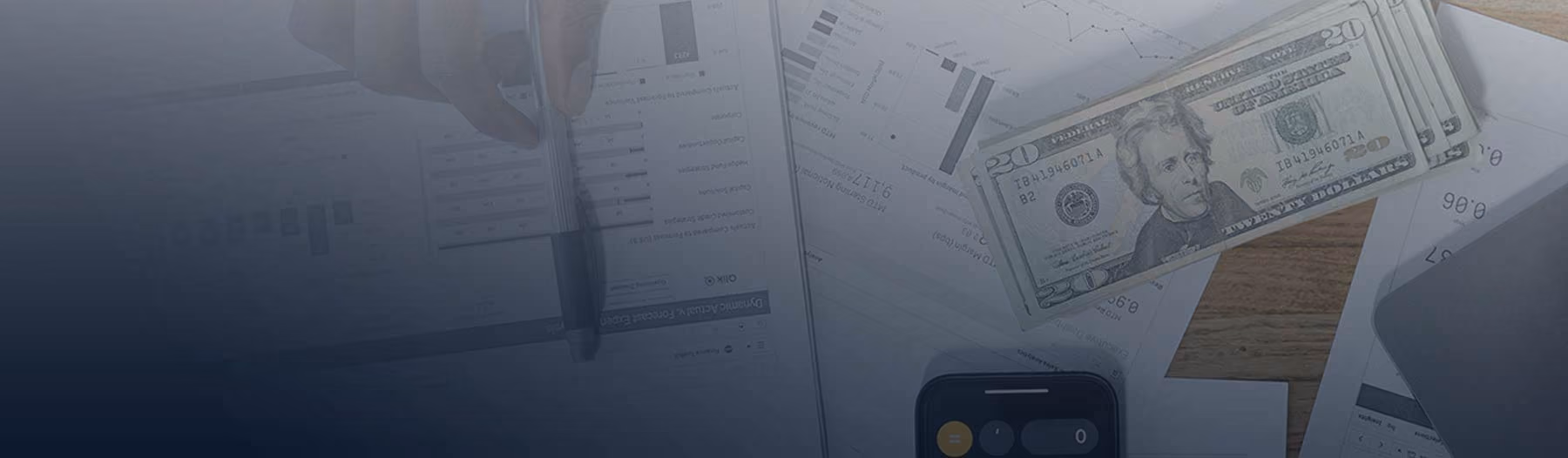 Calculator and U.S. currency representing tax payment calculations