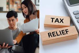 Woman reviewing tax documents at a desk