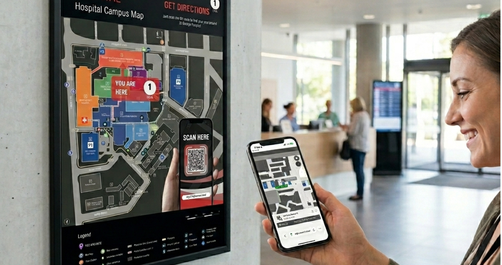A smiling woman holds a smartphone showing a digital map of a hospital campus, standing near a large physical hospital campus map with a QR code to scan for directions.