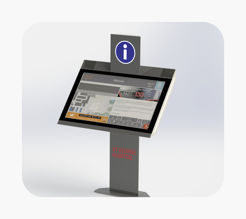Free-standing digital information kiosk for St George Hospital featuring a touchscreen display with hospital welcome information, a site map, and navigation buttons, topped with a large blue information icon.