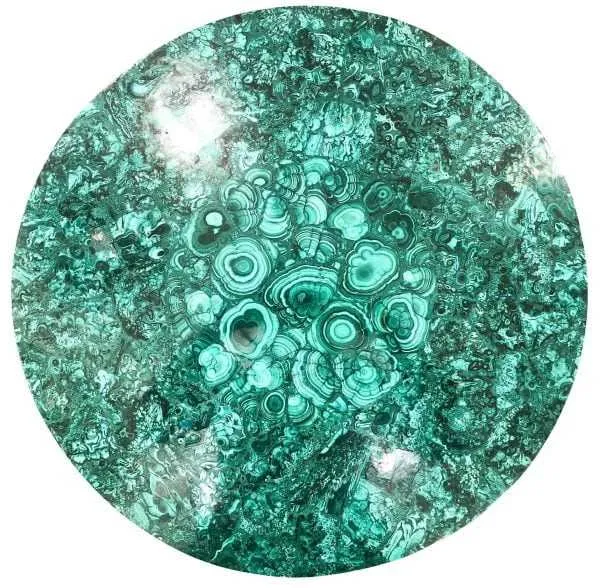 Circular malachite tabletop showing natural green banding and eye patterns