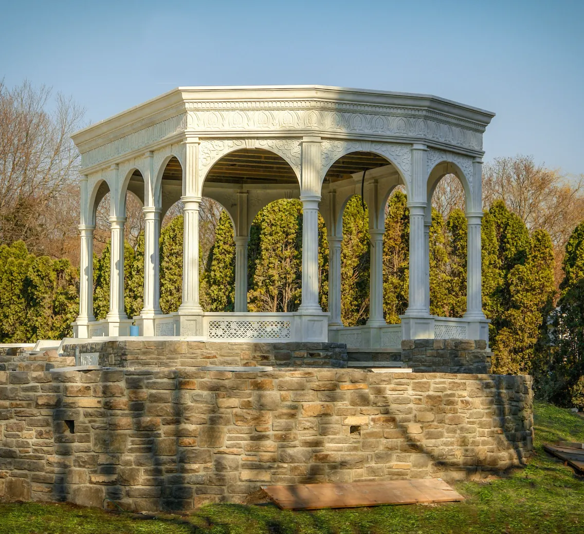 White marble pavilion with a domed roof on a raised fieldstone terrace, Westport, Connecticut estate