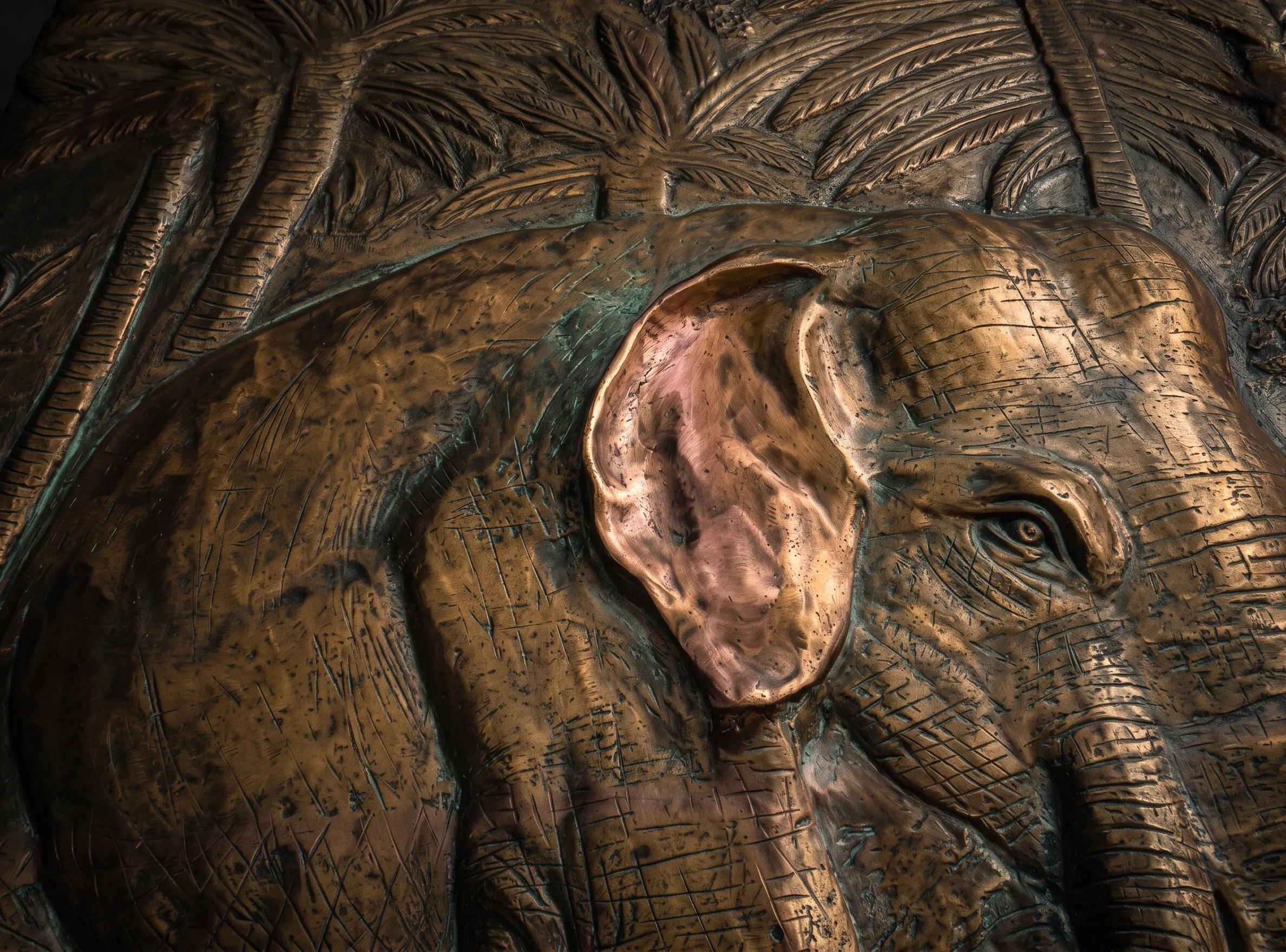 Close-up of the bronze elephant relief showing its patinated ear and trunk, Desert Sanctuary, Palm Springs