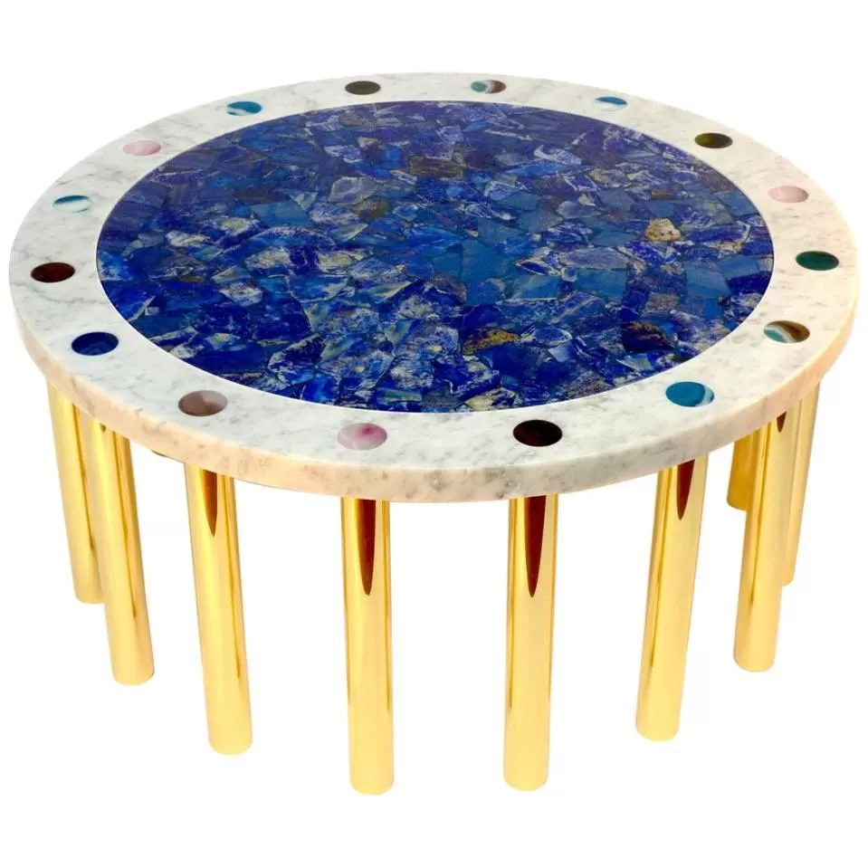 Round table with a lapis lazuli inlay top, a gemstone-studded marble border and polished gold legs