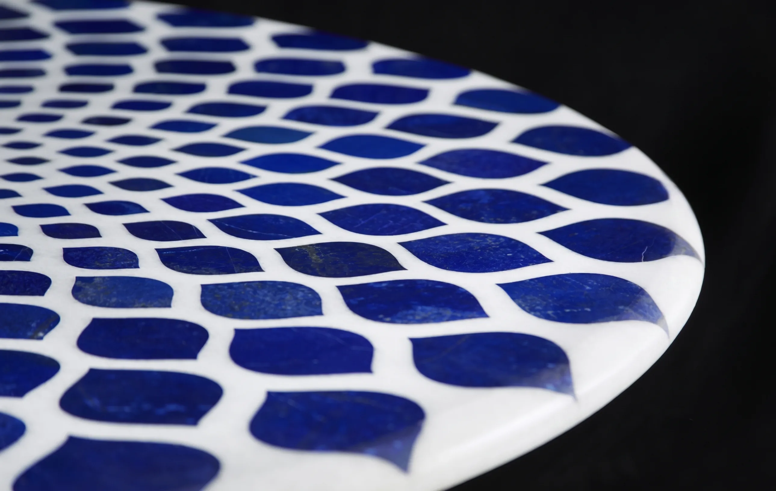 Close-up of lapis lazuli petal inlay set into the white marble tabletop, An Ode to Timeless Mastery