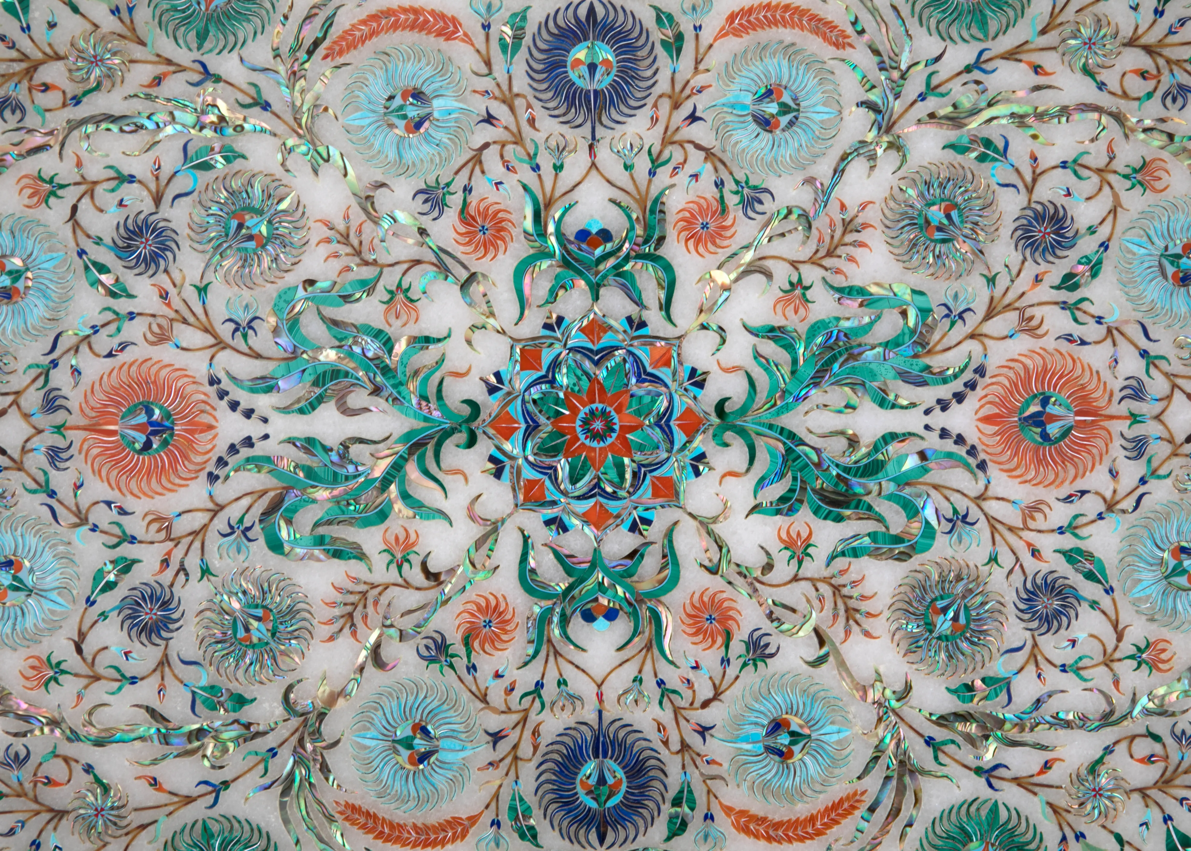 Close-up of turquoise, coral and malachite floral inlay on the Celestial Tapestry platter