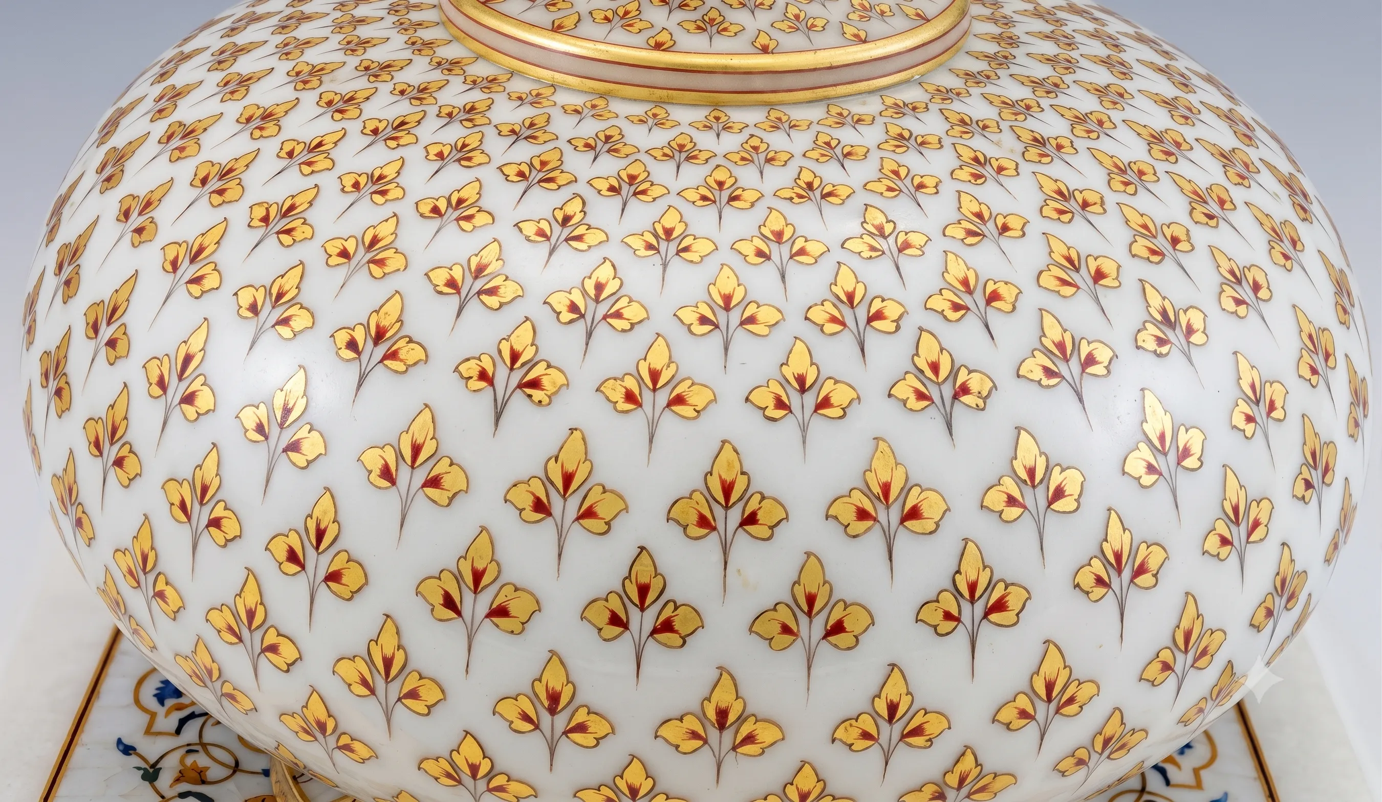 Close-up of the gold-leaf petal pattern on the body of the Imperial Gilded Vessel