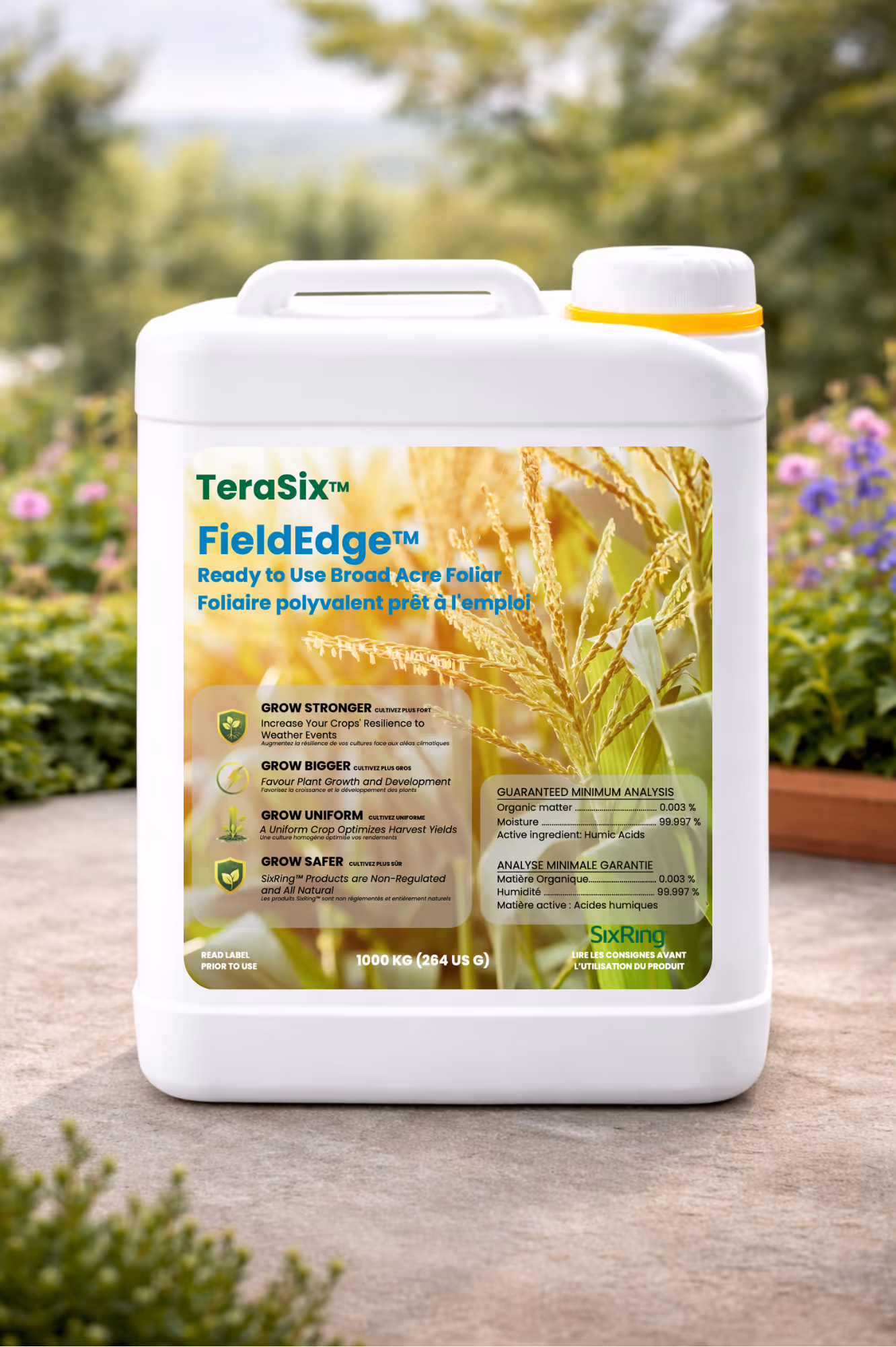 White container of TeraSix FieldEdge broad-acre foliar crop enhancer on outdoor table with plants.