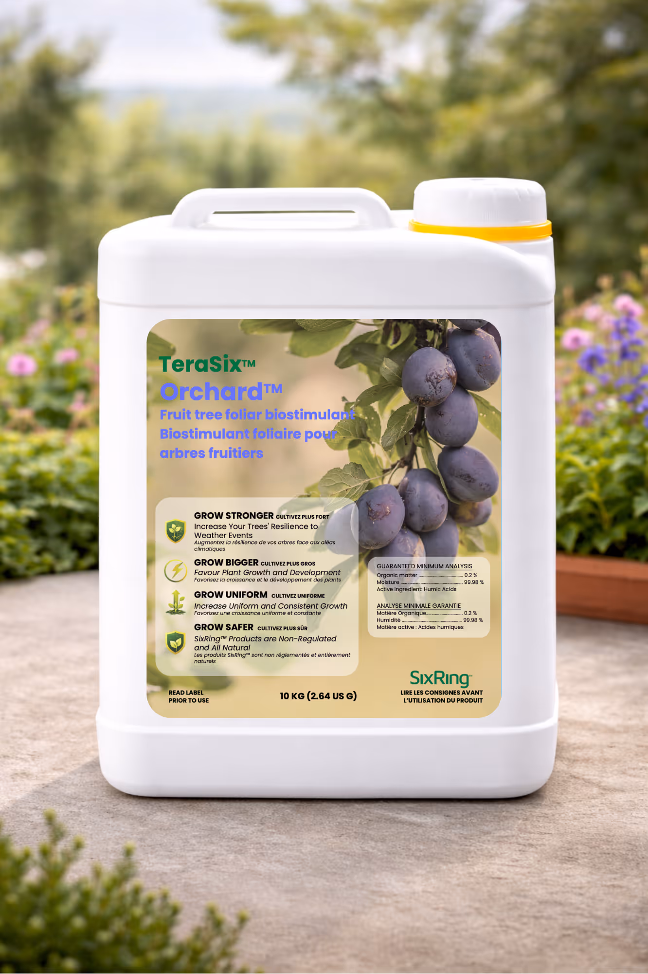 White container of TeraSix Orchard fruit tree foliar biostimulant with plum image on label outdoors.