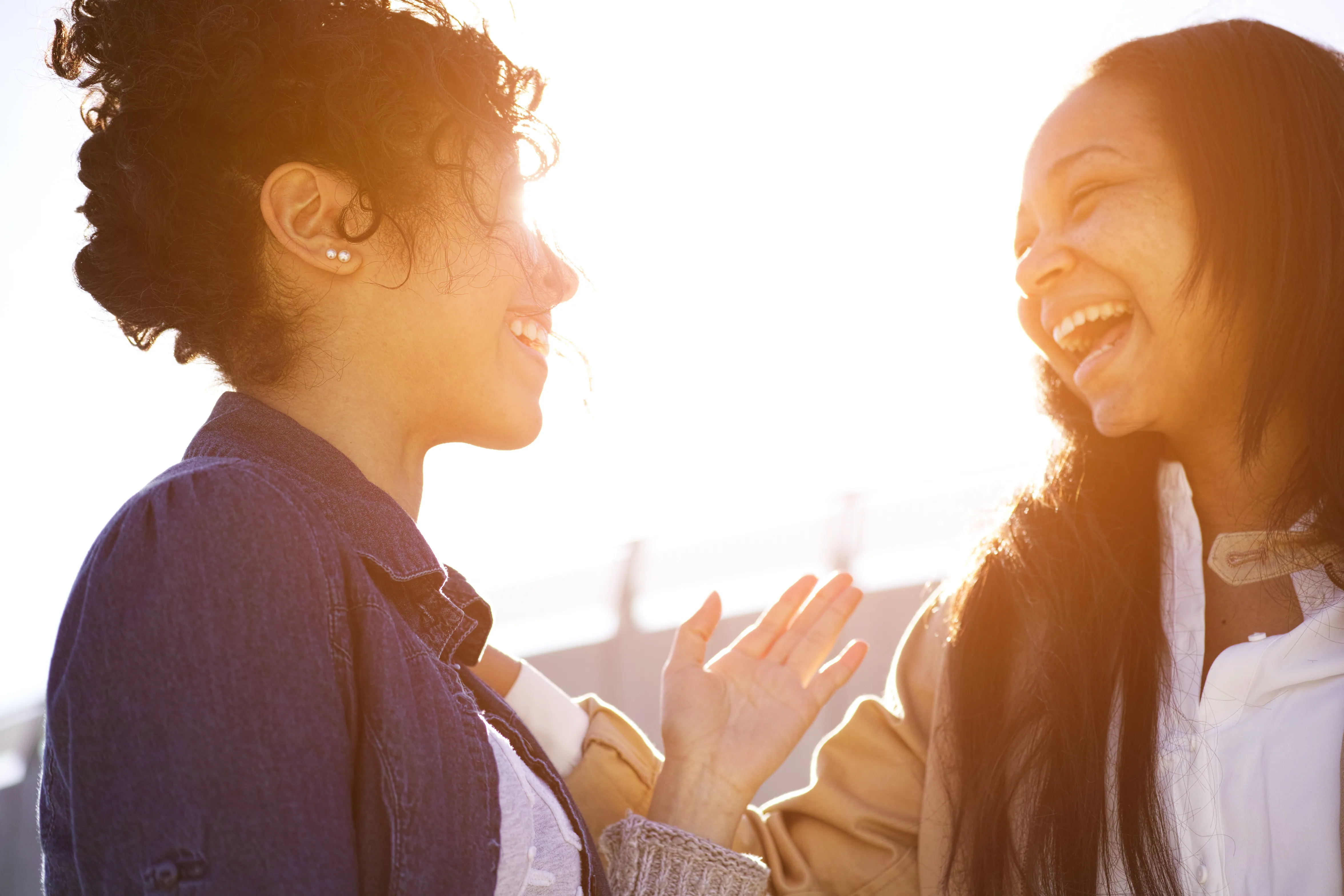 two women speaking to each other
