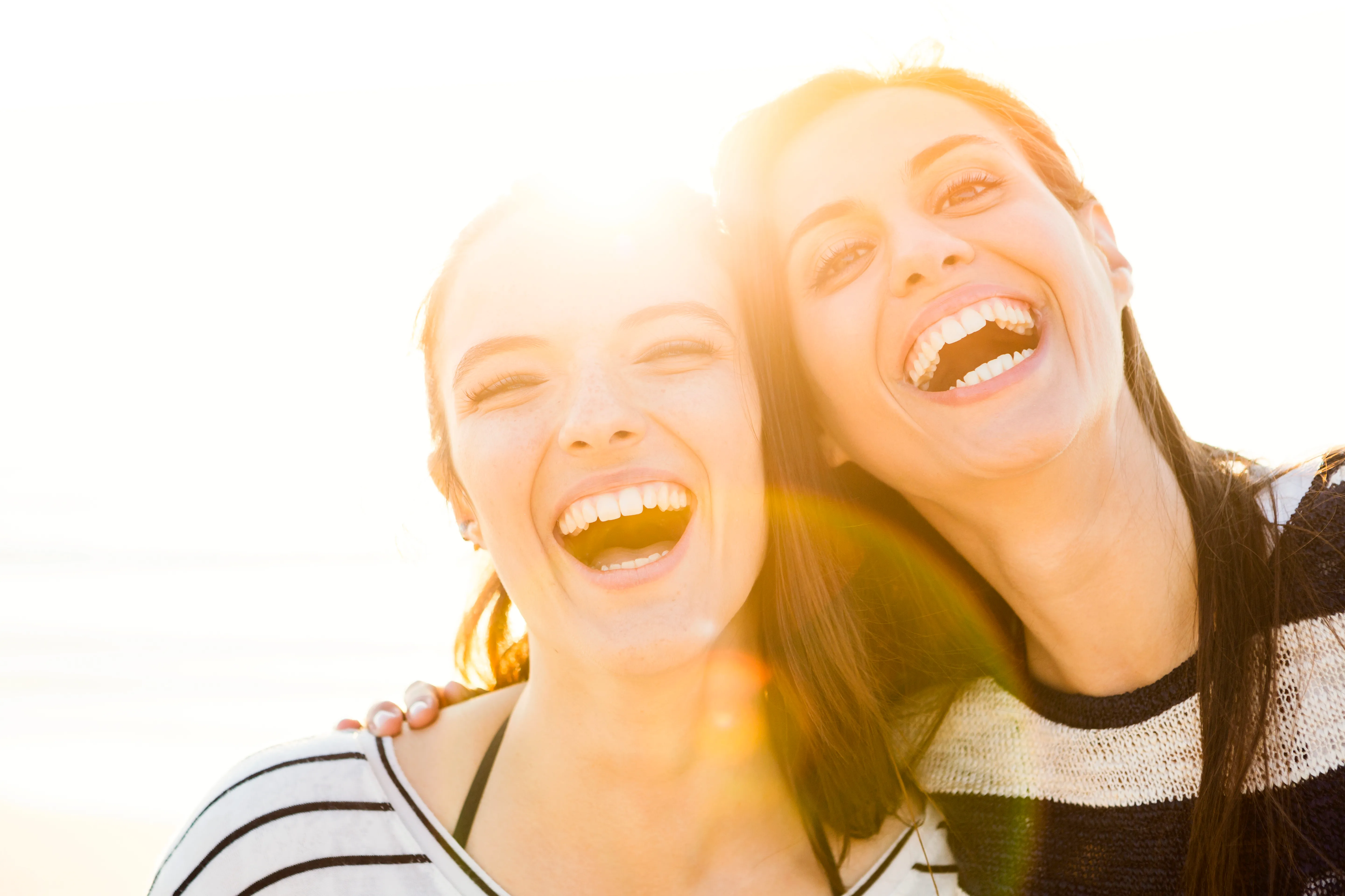 A portrait of best friends laughing