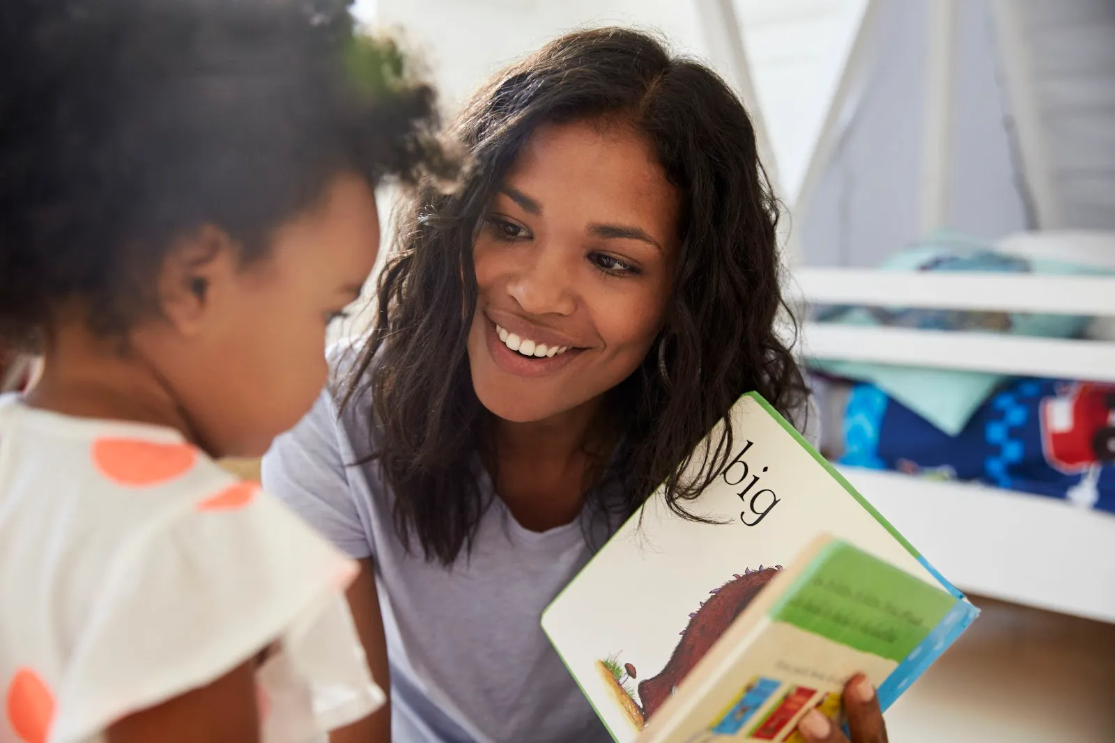 mom and child reading language milestones speecheasy