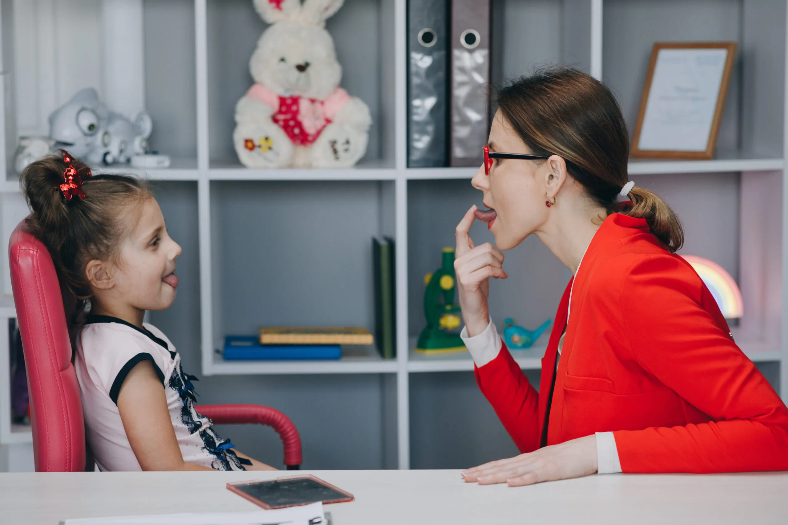 Teacher talking to child